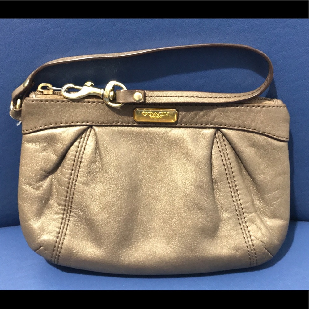 Coach bronze leather wristlet